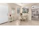 Small dining area with glass table and wicker chairs at 5185 S Eileen Dr, Chandler, AZ 85248