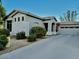 Single-story home with attached two-car garage and landscaped front yard at 5185 S Eileen Dr, Chandler, AZ 85248