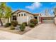 Well-maintained house with driveway and desert landscaping at 5185 S Eileen Dr, Chandler, AZ 85248