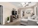 Comfortable living room with a sectional sofa and built-in shelving at 5185 S Eileen Dr, Chandler, AZ 85248