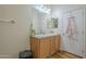 Bathroom with double sinks and a separate shower at 6538 W Eva St, Glendale, AZ 85302