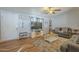 Living room with gray sofas, coffee table, and wood floors at 6538 W Eva St, Glendale, AZ 85302