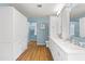 Spacious bathroom with ample storage, double sinks, and a separate toilet room at 6819 E Grandview Dr, Scottsdale, AZ 85254
