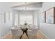 Bright dining nook with decorative chandelier and ample natural light at 6819 E Grandview Dr, Scottsdale, AZ 85254