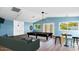 Spacious game room with a pool table, bar stools, and French doors at 6819 E Grandview Dr, Scottsdale, AZ 85254