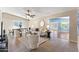 Inviting living room with neutral tones, stylish furniture, and an open layout connecting to the dining area at 6819 E Grandview Dr, Scottsdale, AZ 85254