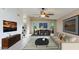 Cozy living room features tile flooring, contemporary furniture, and natural light at 6819 E Grandview Dr, Scottsdale, AZ 85254