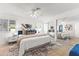 Comfortable main bedroom with modern decor, stylish bedding, and natural light, offering a peaceful retreat at 6819 E Grandview Dr, Scottsdale, AZ 85254