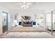 Comfortable main bedroom with modern decor, stylish bedding, and natural light, offering a peaceful retreat at 6819 E Grandview Dr, Scottsdale, AZ 85254