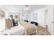 Comfortable main bedroom with modern decor, stylish bedding, and natural light, offering a peaceful retreat at 6819 E Grandview Dr, Scottsdale, AZ 85254