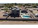 Aerial view of home with pool, perimeter fence and covered parking at 7214 N 183Rd Ave, Waddell, AZ 85355