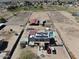 Aerial view of the property with horse facilities, pool, well and desert style yard at 7214 N 183Rd Ave, Waddell, AZ 85355