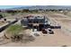 Lovely exterior view of desert home with private balconies, well maintained landscaping, and desert style yard at 7214 N 183Rd Ave, Waddell, AZ 85355