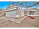 Single story home with attached garage and landscaped front yard at 8275 N 112Th Ave, Peoria, AZ 85345