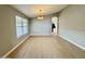 Light and airy dining room with hardwood floors at 9829 E Onza Ave, Mesa, AZ 85212