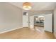 Bright and airy entryway with light wood flooring at 9829 E Onza Ave, Mesa, AZ 85212