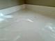 Close-up view of a modern kitchen countertop with white quartz and subtle gray veining at 9829 E Onza Ave, Mesa, AZ 85212