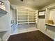 Bright walk-in closet with ample shelving and hanging space at 9829 E Onza Ave, Mesa, AZ 85212