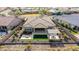 Aerial view of house with backyard, pergola, and fire pit at 11578 W Montansoro Ln, Peoria, AZ 85383