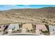 Aerial view of homes showcasing desert landscape at 11578 W Montansoro Ln, Peoria, AZ 85383