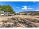 Community green space with homes in the background at 11578 W Montansoro Ln, Peoria, AZ 85383