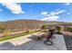 Firepit area with comfortable seating, perfect for relaxing at 11578 W Montansoro Ln, Peoria, AZ 85383