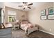 Cozy bedroom with a double bed and window at 1180 E Ridgerock St, Casa Grande, AZ 85122