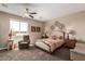Bright bedroom with a comfy chair and large window at 1180 E Ridgerock St, Casa Grande, AZ 85122