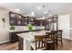 Modern kitchen with granite countertops and dark cabinets at 1180 E Ridgerock St, Casa Grande, AZ 85122