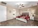 Spacious main bedroom with carpet and en-suite bathroom at 1180 E Ridgerock St, Casa Grande, AZ 85122