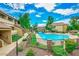 Community pool with surrounding landscaping at 1331 W Baseline Rd # 260, Mesa, AZ 85202