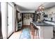 Modern kitchen with gray island, white cabinets, and copper accents at 1413 E Brill St, Phoenix, AZ 85006