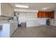 Laundry room with washer, dryer and cabinets at 15013 N Cameo Dr, Sun City, AZ 85351