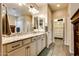 Elegant bathroom with granite countertops and walk-in shower at 17103 S 182Nd Ln, Goodyear, AZ 85338