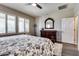 Spacious bedroom with large windows and neutral tones at 17103 S 182Nd Ln, Goodyear, AZ 85338