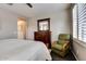 Relaxing bedroom with comfy chair and dresser at 17103 S 182Nd Ln, Goodyear, AZ 85338