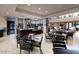 Community room with bar and comfortable seating at 17103 S 182Nd Ln, Goodyear, AZ 85338