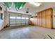 Garage with opener and extra storage cabinets at 17103 S 182Nd Ln, Goodyear, AZ 85338