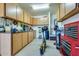 Well-equipped workshop area in garage with tool storage at 17103 S 182Nd Ln, Goodyear, AZ 85338