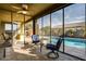 Covered patio overlooking the pool and backyard at 17103 S 182Nd Ln, Goodyear, AZ 85338