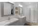 Modern bathroom with double vanity and shower at 18446 E Azul Ct, Gold Canyon, AZ 85118