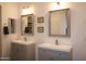 Double vanity bathroom with gray cabinets and mirrors at 18446 E Azul Ct, Gold Canyon, AZ 85118