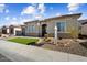 Single-story home with a two-car garage and landscaped front yard at 19045 N 269Th Dr, Buckeye, AZ 85396