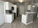 Modern kitchen with white cabinets and marble countertops at 1941 S Pierpont Dr # 1090, Mesa, AZ 85206