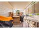 Covered patio with wood deck, BBQ area, and outdoor seating at 201 S Greenfield Rd # 142, Mesa, AZ 85206