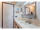 Clean bathroom with single vanity and mirror at 201 S Greenfield Rd # 142, Mesa, AZ 85206