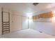 Bedroom with built-in dresser and sliding closet doors at 201 S Greenfield Rd # 142, Mesa, AZ 85206