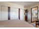 Bedroom with large closet and bathroom access at 201 S Greenfield Rd # 142, Mesa, AZ 85206