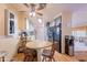 Casual dining area with built-in seating and kitchen views at 201 S Greenfield Rd # 142, Mesa, AZ 85206