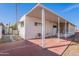 Side view of the house, showing the carport and patio at 201 S Greenfield Rd # 142, Mesa, AZ 85206